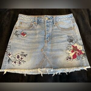 American Eagle Embroidered Denim Skirt with Floral Design.